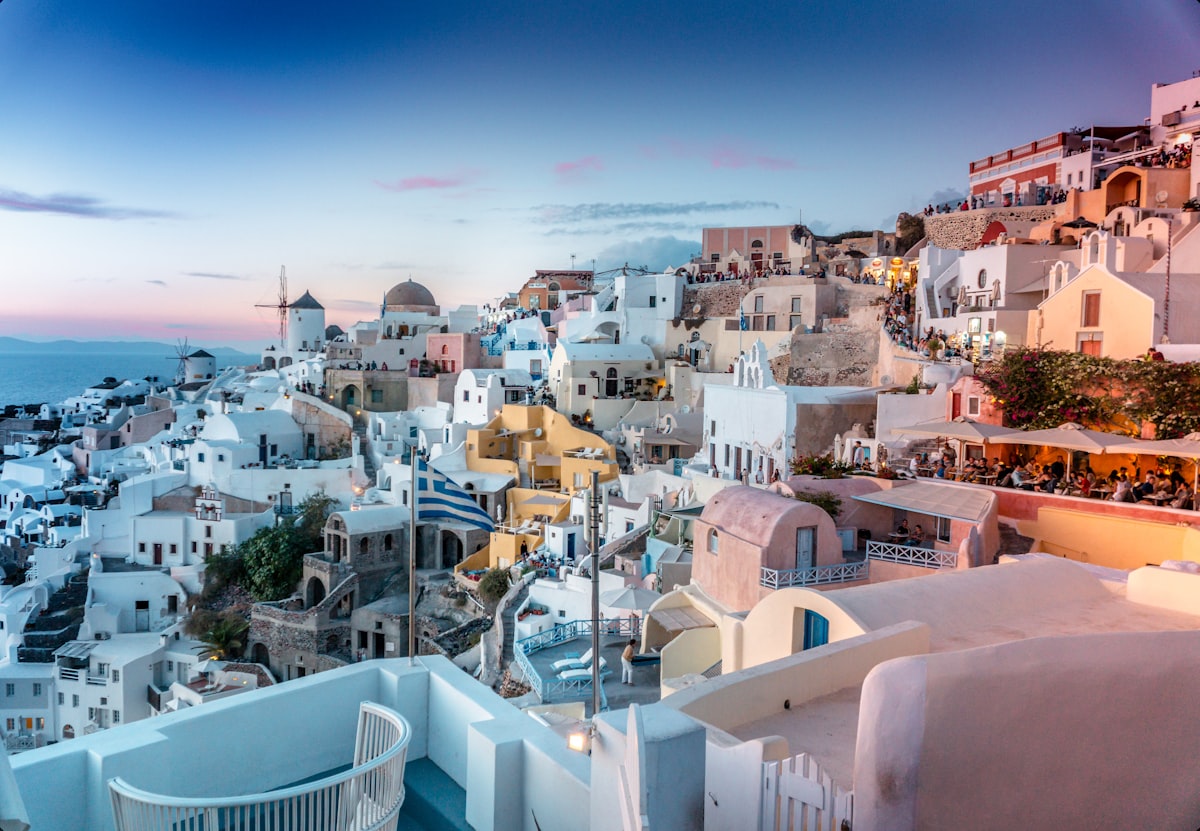 Whitewashed houses of Oia, Santorini at dusk